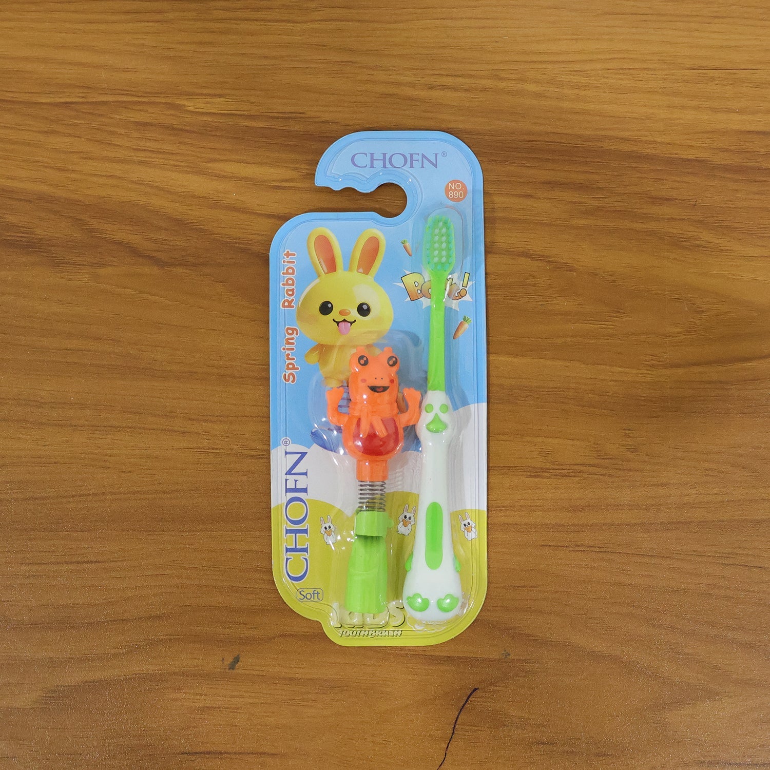 children toothbrush with frog toy