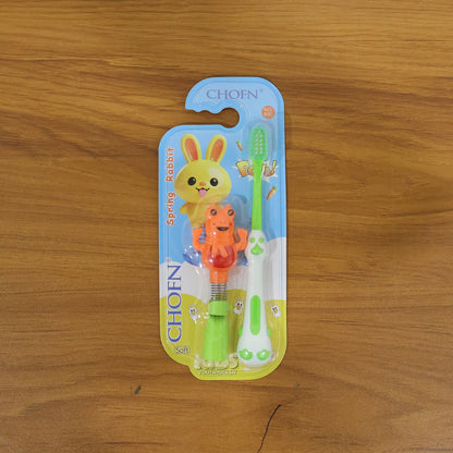 children toothbrush with frog toy